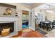 Living room with a fireplace and an entrance to a screened-in porch at 100 Lantana Dr, Locust Grove, GA 30248