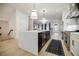 Well-equipped kitchen with a central island, stainless steel appliances and open layout at 1076 Green St, Roswell, GA 30075