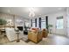 Inviting living room features a fireplace, stylish furniture, and natural light at 1076 Green St, Roswell, GA 30075