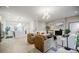 Open-concept living space features a fireplace, modern decor, and open to the kitchen at 1076 Green St, Roswell, GA 30075