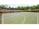 Community basketball court with well-maintained lines and court enhances recreational amenities at 1529 Shiloh Manor Ct, Marietta, GA 30066