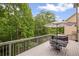Spacious deck with outdoor dining set and wooded views, perfect for entertaining and enjoying the outdoors at 1529 Shiloh Manor Ct, Marietta, GA 30066