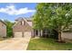 Beautiful two-story home with brick and siding, featuring a well-kept lawn and spacious driveway at 1529 Shiloh Manor Ct, Marietta, GA 30066