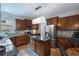 Bright kitchen featuring a center island, stainless steel appliances and wood cabinets for a modern cooking experience at 1529 Shiloh Manor Ct, Marietta, GA 30066