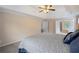 Bright main bedroom featuring a tray ceiling and access to a luxurious ensuite bathroom at 1529 Shiloh Manor Ct, Marietta, GA 30066