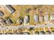 Aerial view of neighborhood with house highlighted and surrounded by mature trees at 345 Wellington Sw St, Atlanta, GA 30310