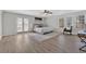 The primary bedroom features an area rug, a ceiling fan, artwork and great natural light at 345 Wellington Sw St, Atlanta, GA 30310