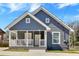 Charming home with a gray exterior, white trim, and a covered porch at 345 Wellington Sw St, Atlanta, GA 30310