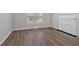 A cozy room features laminate floors, natural light, and a decorative fireplace at 345 Wellington Sw St, Atlanta, GA 30310