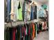 Organized walk-in closet with hanging rods and shelves providing ample storage space at 5920 Hart Way, Cumming, GA 30028