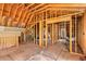 Unfinished attic space with exposed wooden framing and natural light, offering potential for customization at 1285 Wesley Nw Pl, Atlanta, GA 30327