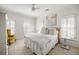 Cozy bedroom featuring plantation shutters, neutral walls, and comfortable furnishings at 1285 Wesley Nw Pl, Atlanta, GA 30327