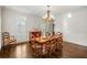 Elegant dining room with a chandelier, hardwood floors, and plenty of space for entertaining at 1285 Wesley Nw Pl, Atlanta, GA 30327