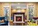 A close view of the detailed fireplace with a marble surround and ornate wood mantle at 1285 Wesley Nw Pl, Atlanta, GA 30327