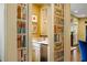 Charming hallway with custom wallpaper, a sink, and access to the living room at 1285 Wesley Nw Pl, Atlanta, GA 30327