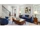 Bright living room with hardwood floors, stylish furnishings, and ample natural light at 1285 Wesley Nw Pl, Atlanta, GA 30327