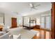 Large main bedroom with hardwood floors, sitting area, and french doors at 1285 Wesley Nw Pl, Atlanta, GA 30327