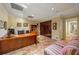 Home office space with a large desk, built-in bookshelves, and comfortable seating at 1285 Wesley Nw Pl, Atlanta, GA 30327