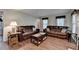 Cozy living room with a fireplace and ample seating at 1900 Shady Creek Ln, Lawrenceville, GA 30043