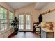 Bright sunroom with large windows and access to the outdoors at 1900 Shady Creek Ln, Lawrenceville, GA 30043