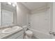 Bathroom featuring a vanity, toilet, and bathtub/shower combo, all in a clean, bright design at 2534 Grayton Loop, Villa Rica, GA 30180