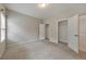 Bedroom with plush carpeting, and two spacious closets, offering ample storage at 2534 Grayton Loop, Villa Rica, GA 30180