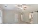 Spacious bedroom with carpet, ceiling fan, and sliding barn door at 2534 Grayton Loop, Villa Rica, GA 30180