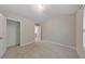 A bright bedroom with a closet and an open doorway, offering space and functionality at 2534 Grayton Loop, Villa Rica, GA 30180
