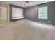 Spacious bonus room featuring carpet and a large window at 2534 Grayton Loop, Villa Rica, GA 30180