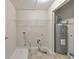 Functional laundry room with shelving and a water heater, providing practicality and storage at 2534 Grayton Loop, Villa Rica, GA 30180