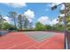 Well-maintained tennis courts surrounded by lush trees, providing an excellent recreational amenity for community residents at 2534 Grayton Loop, Villa Rica, GA 30180