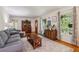 Bright living room with hardwood floors, neutral paint, and lots of natural light at 4730 Geneva Sw Dr, Lilburn, GA 30047
