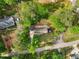 Aerial view of a charming home with lush landscaping and a private backyard at 4840 Moon Rd, Powder Springs, GA 30127