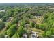 Scenic aerial view showcases the property amidst a lush green landscape at 4840 Moon Rd, Powder Springs, GA 30127