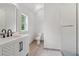 Bathroom featuring vanity, toilet, and glass-enclosed shower with tile flooring at 4840 Moon Rd, Powder Springs, GA 30127