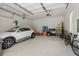 Spacious two car garage featuring clean white walls and ample storage space for vehicles and equipment at 4840 Moon Rd, Powder Springs, GA 30127
