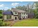 Charming two-story home with a spacious backyard and a convenient storage shed at 4840 Moon Rd, Powder Springs, GA 30127