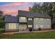 Beautiful two-story home featuring a manicured lawn and modern design elements at 4840 Moon Rd, Powder Springs, GA 30127