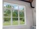 Large, bright windows provide ample natural light and offer views of lush greenery and landscaping at 4840 Moon Rd, Powder Springs, GA 30127