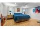 Cozy bedroom featuring a comfortable bed, ceiling fan, and bright window treatments at 5148 Stratham Dr, Dunwoody, GA 30338