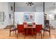 Dining room featuring hardwood floors and an elegant table set with seating for six at 5148 Stratham Dr, Dunwoody, GA 30338