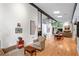 Open concept living space with dining and sitting areas, large windows, and plenty of natural light at 5148 Stratham Dr, Dunwoody, GA 30338