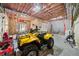 Basement with a yellow four-wheeler, a Georgia banner, and a weight training area at 121 Harmony Oaks Trl, Canton, GA 30115