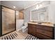 Bathroom featuring a glass enclosed shower, neutral color palette, and granite countertops at 121 Harmony Oaks Trl, Canton, GA 30115