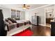 Bedroom featuring hardwood floors, natural light, neutral walls and warm accents at 121 Harmony Oaks Trl, Canton, GA 30115