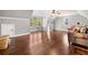 Expansive bonus room with wood floors, natural light, and comfortable seating area at 121 Harmony Oaks Trl, Canton, GA 30115