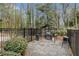 Community BBQ area featuring a grill, seating and a metal fence at 2002 Country Park Se Dr, Smyrna, GA 30080