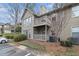 A condo with a two-story facade and a small balcony showcasing the exterior features at 2002 Country Park Se Dr, Smyrna, GA 30080