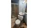 A bathroom with a shower stall, toilet, and corner sink at 2886 The Fontainebleau Sw, Atlanta, GA 30331