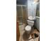 A bathroom with a shower stall, toilet, and corner sink at 2886 The Fontainebleau Sw, Atlanta, GA 30331